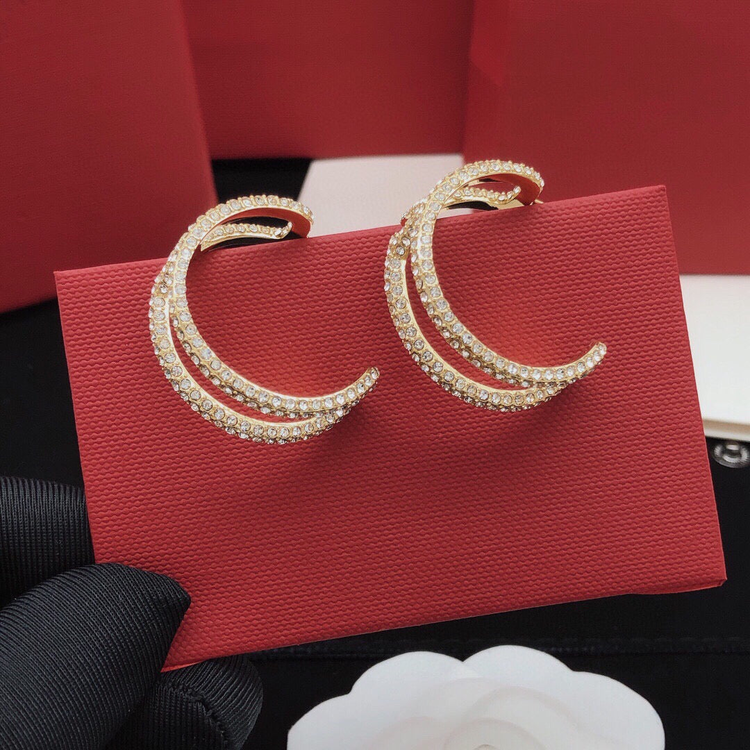 Martin Graham earrings in polished metal-tone – detail view