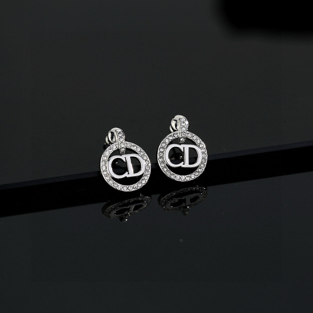 Martin Graham earrings in polished metal-tone – detail view