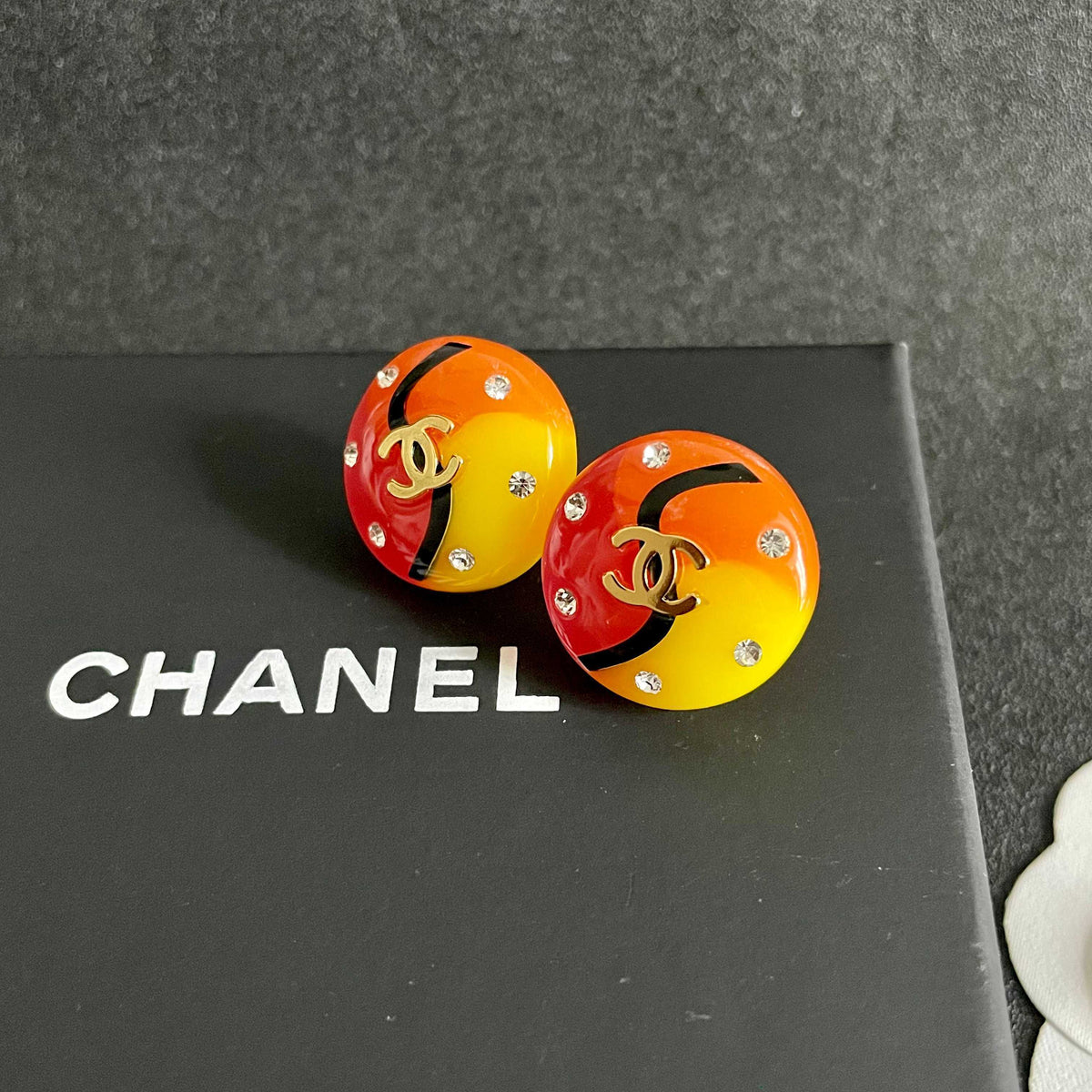 Martin Graham stud earrings in polished metal-tone – detail view