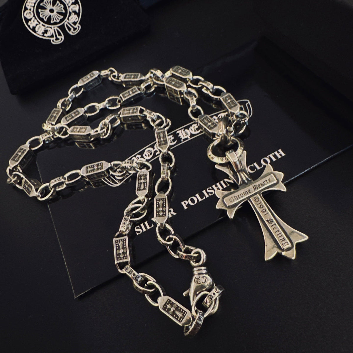 Martin Graham pendant necklace in polished metal-tone – detail view