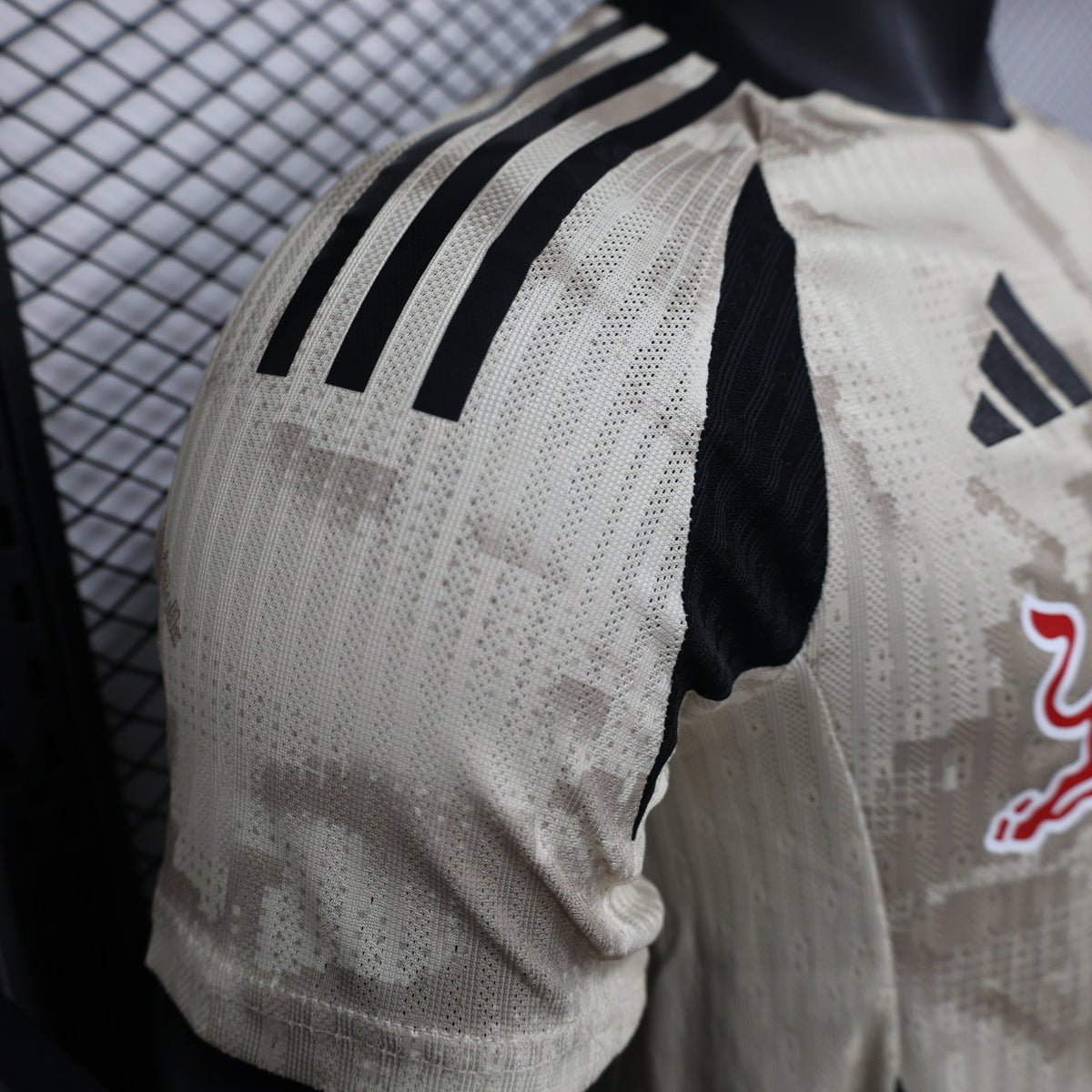 2025/26 New York Red Bulls Away Player Version Jersey - Adidas - Off-White Cream Desert Camouflage Pattern - Black Side Panels - Red Bull Double Bull Yellow Sun Crest