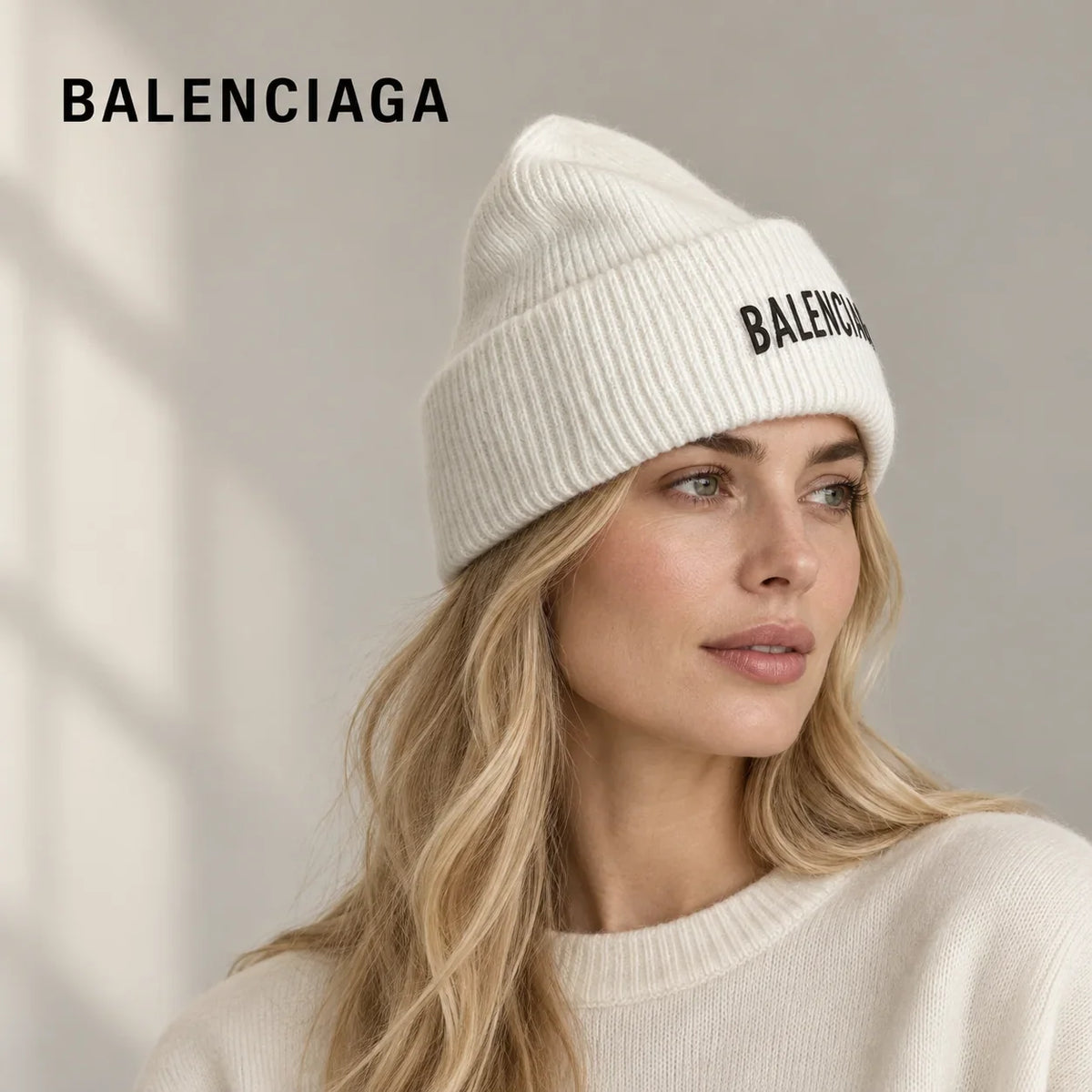 Balenciaga ribbed knit beanie worn by an adult female model