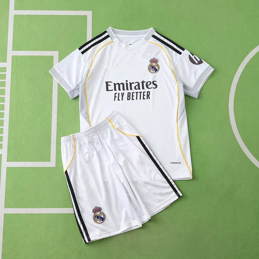 Real Madrid CF Home Kids Kit 2025/26 – White Football Jersey & Shorts Set with Gold Trim