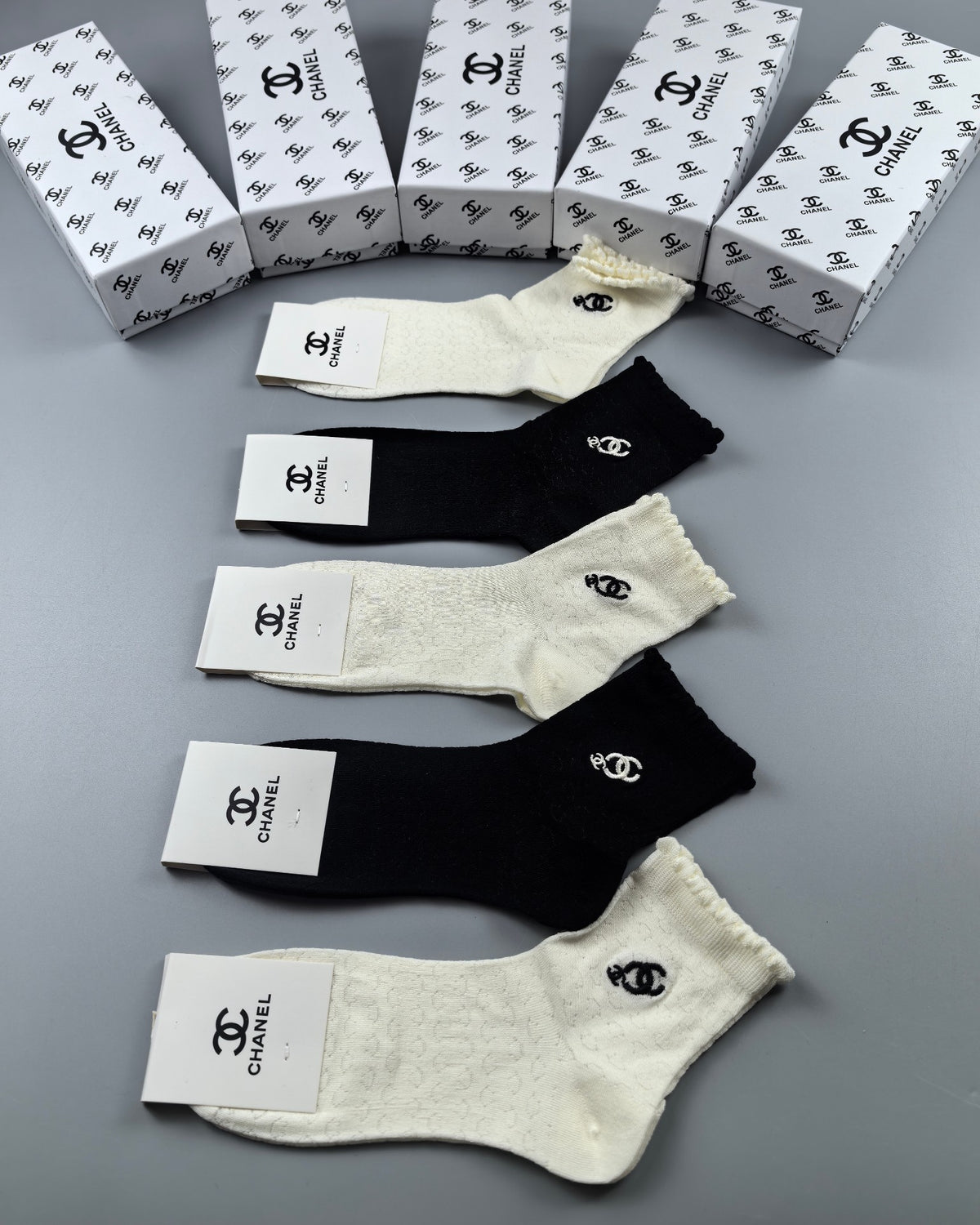 CHANEL Compact Emblem Pale-and-Dark Socks, gallery image 1