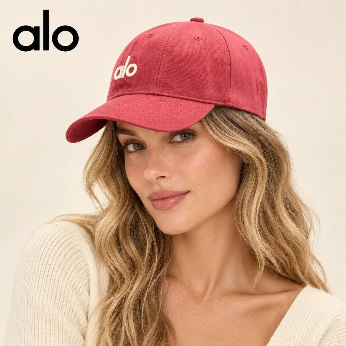 Model wearing alo baseball cap on head