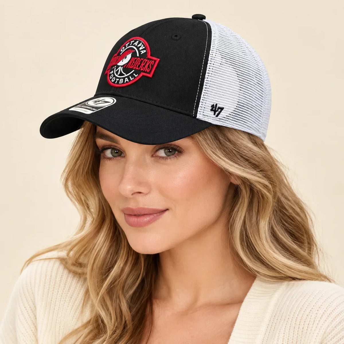 Model wearing baseball cap on head