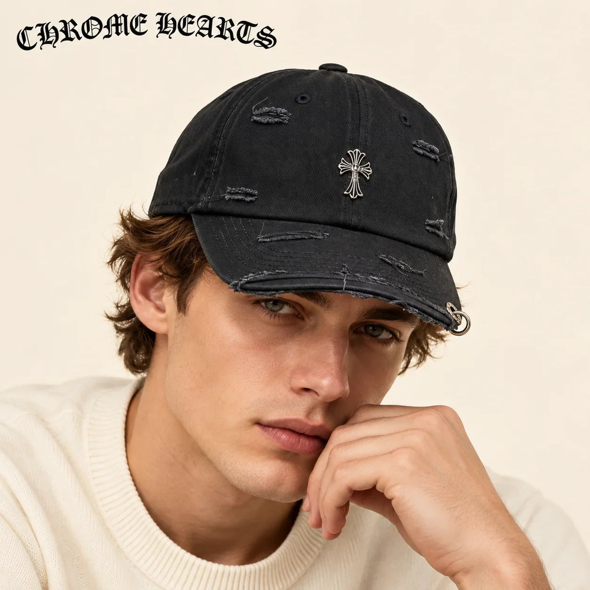 Model wearing chrome hearts baseball cap on head