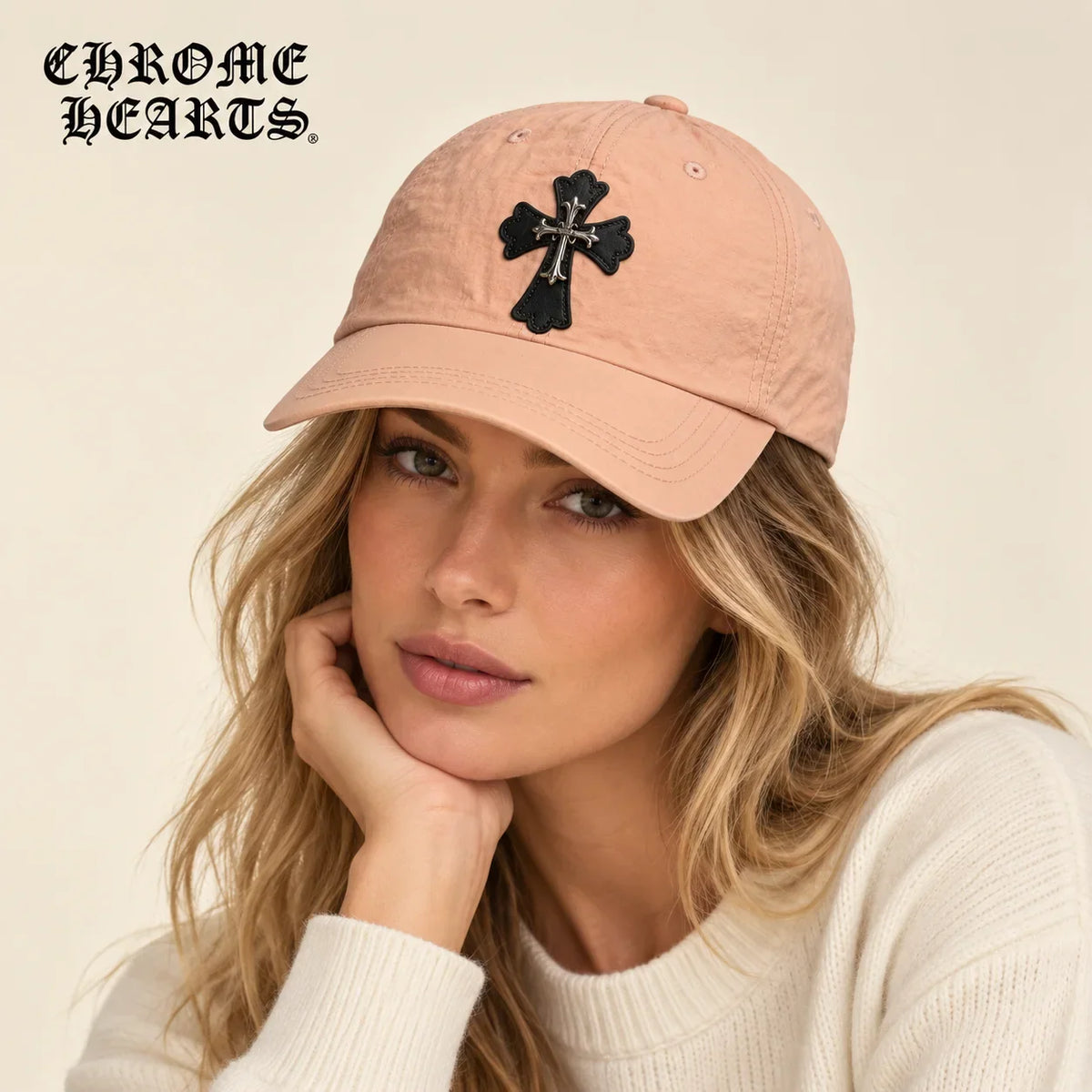 Model wearing chrome hearts baseball cap on head