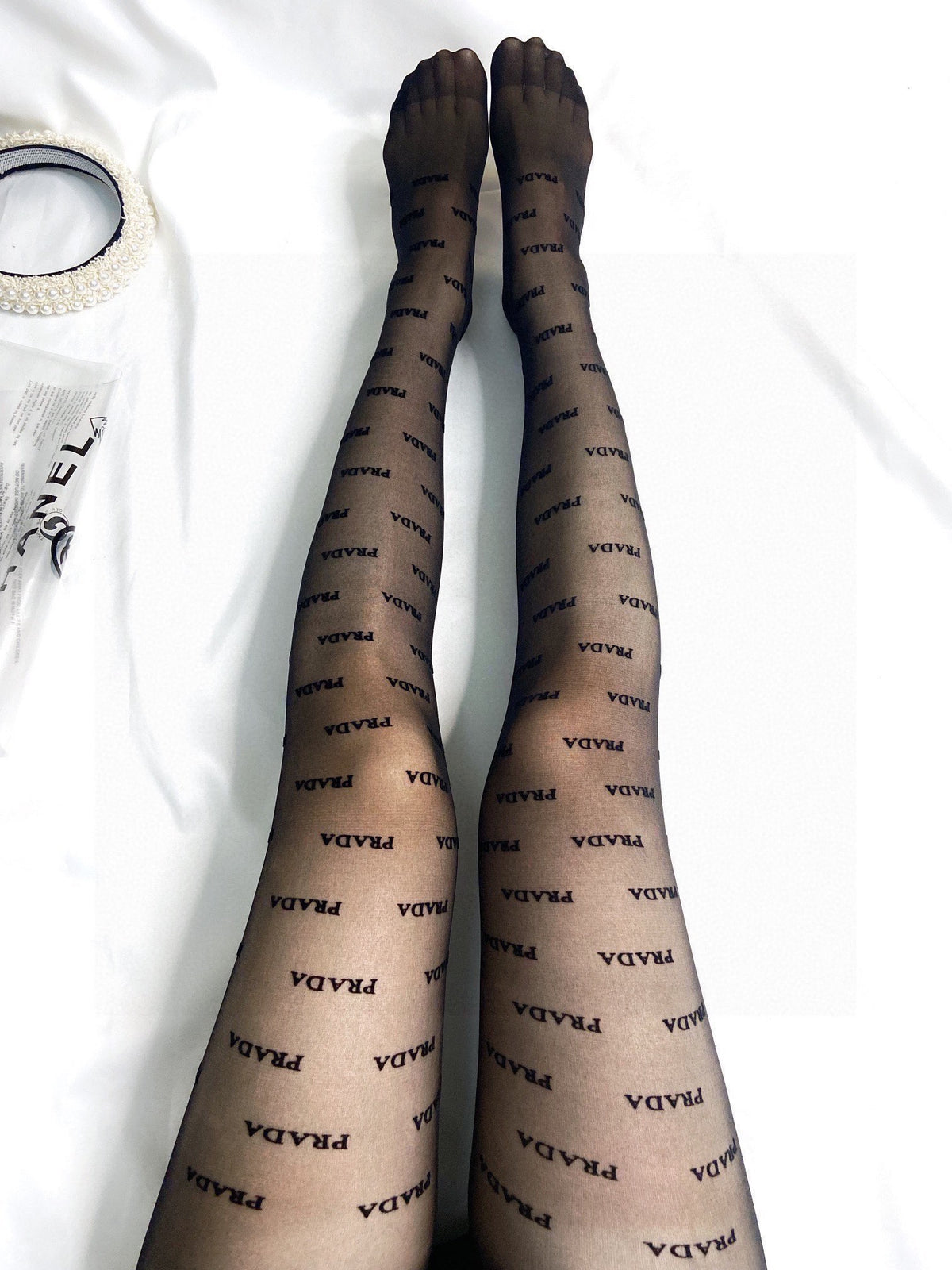 Prada Black Sheer Repeating Wordmarks Patterned Tights, image 1