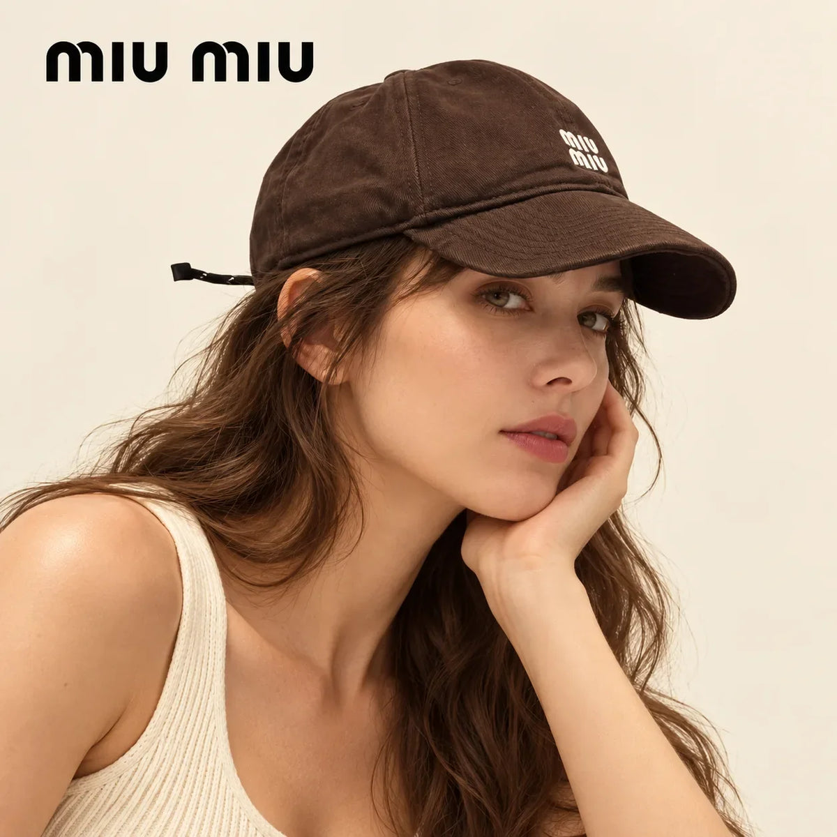 Model wearing Miu Miu Embroidered Baseball Cap
