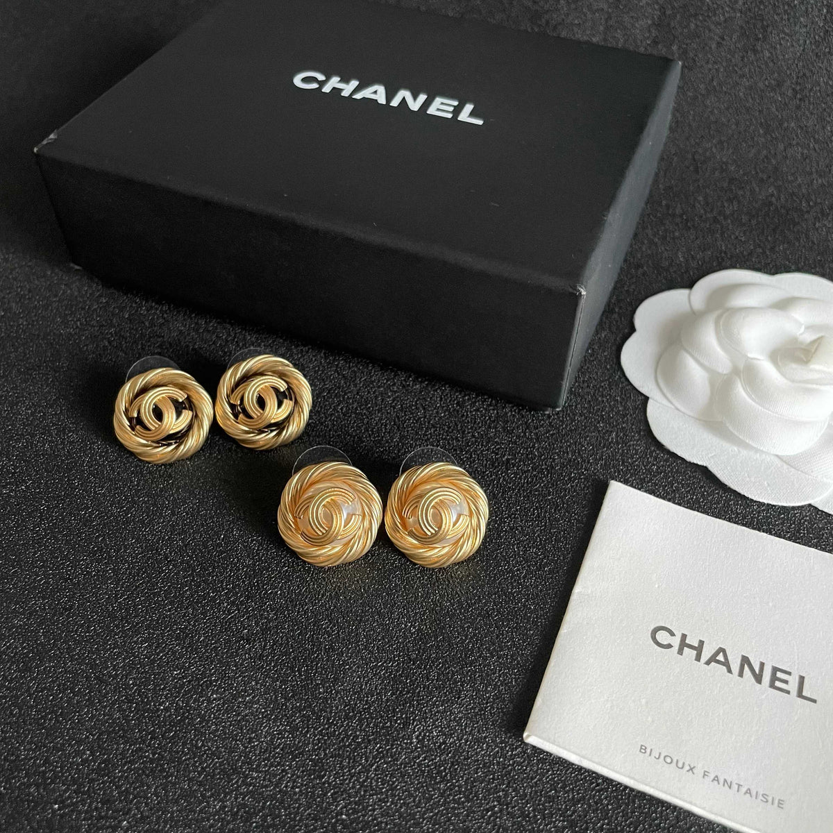 Martin Graham stud earrings in polished metal-tone – side detail