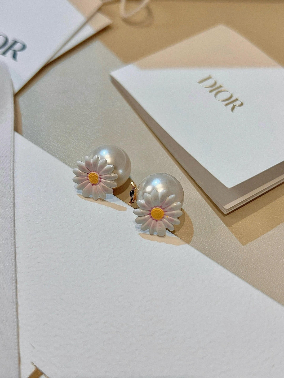 Martin Graham stud earrings in polished metal-tone