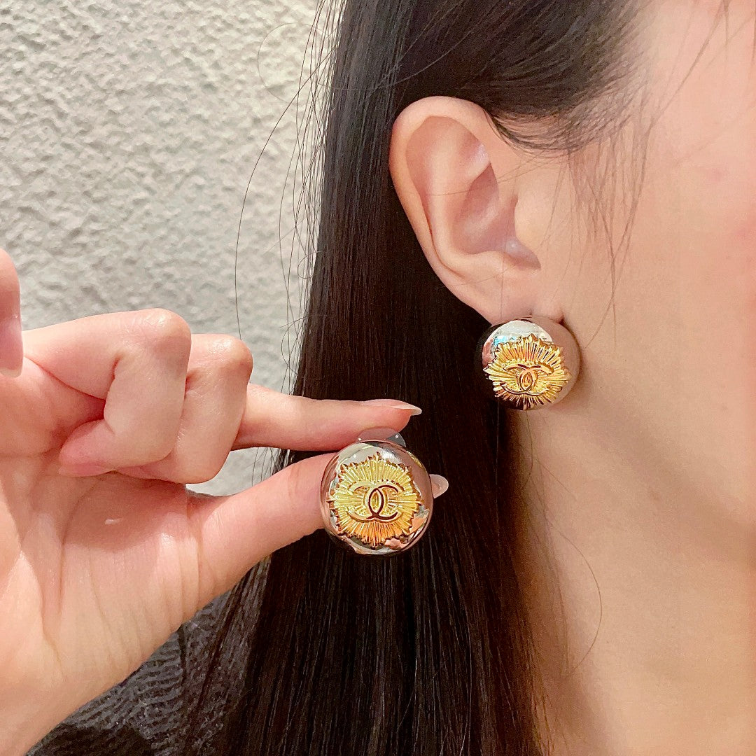 Martin Graham stud earrings in polished metal-tone – main product view