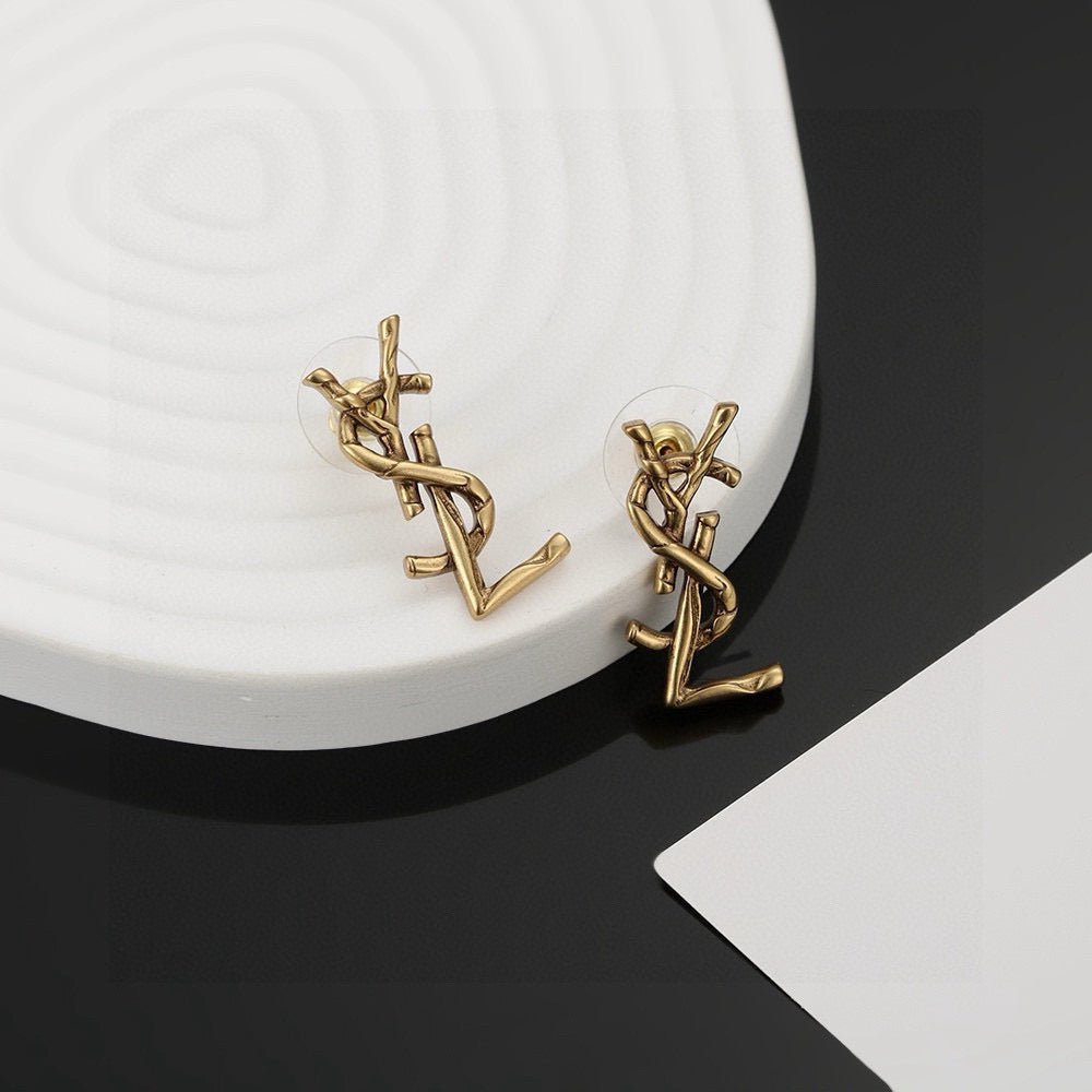 Martin Graham stud earrings in polished metal-tone – main product view