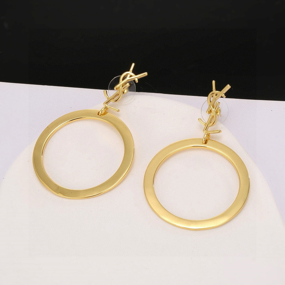 Martin Graham stud earrings in polished metal-tone – main product view