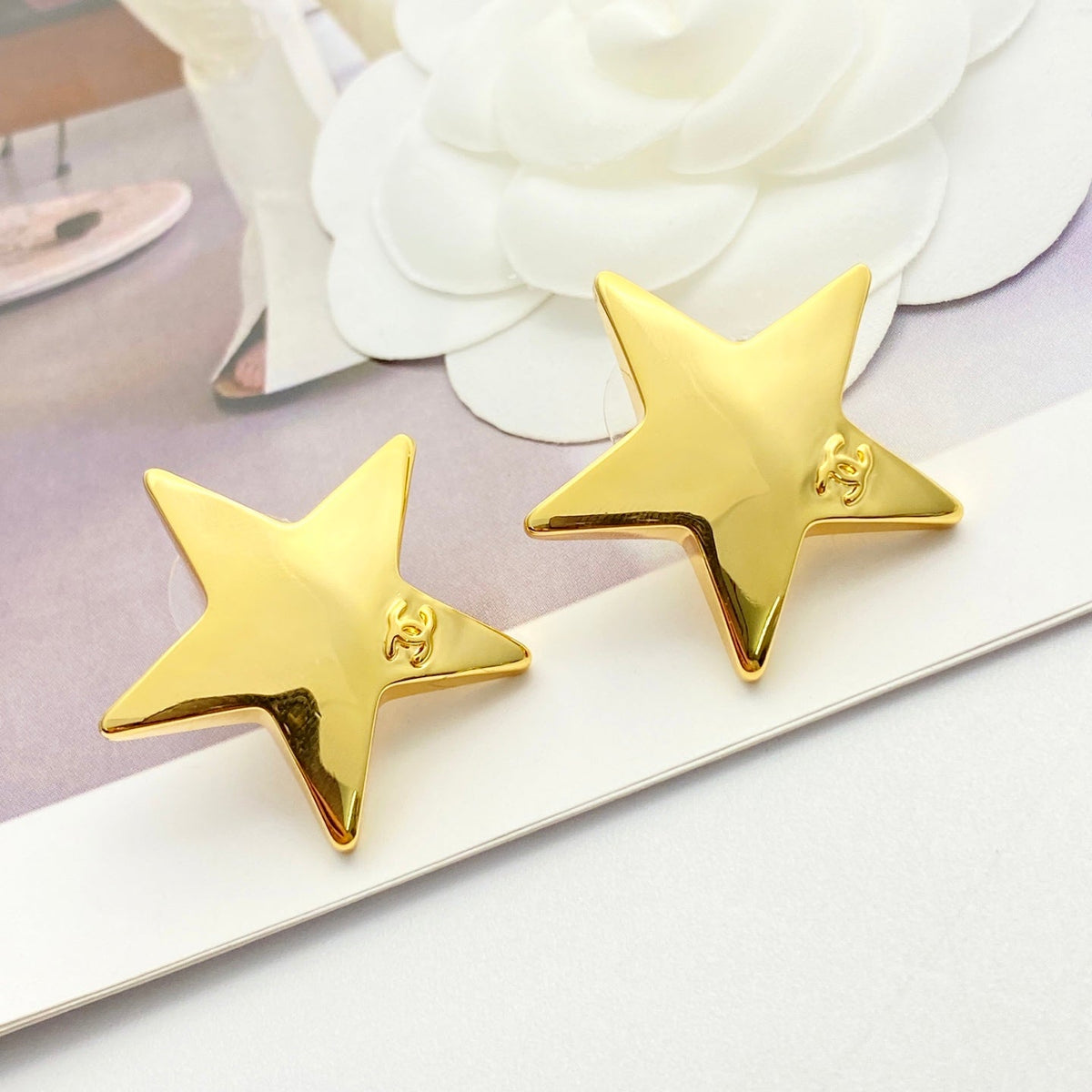 Martin Graham stud earrings in polished metal-tone – main product view