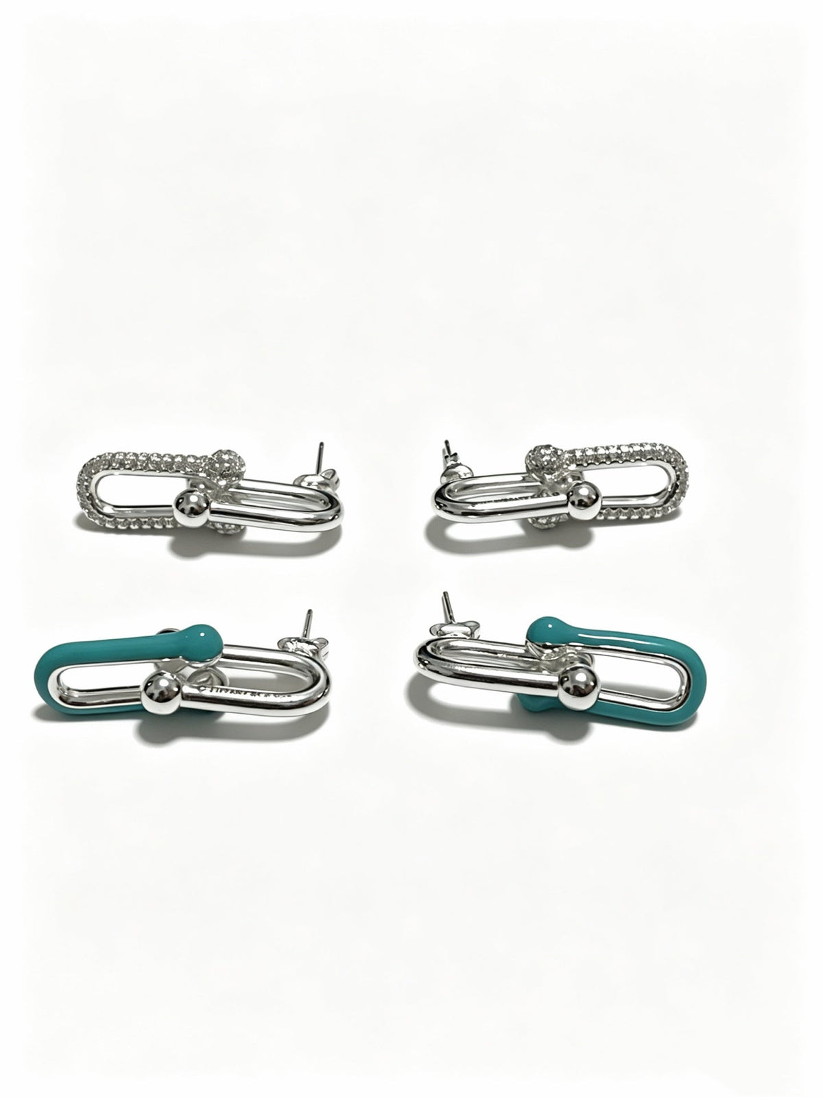 Martin Graham stud earrings in polished metal-tone – main product view
