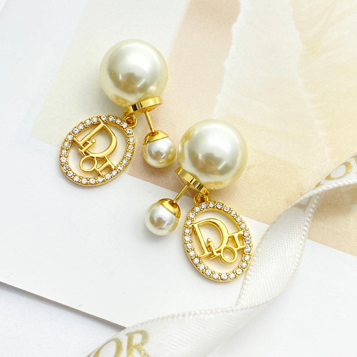 Martin Graham stud earrings in polished metal-tone – main product view