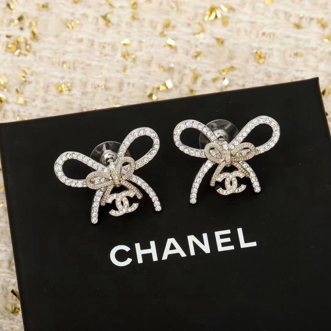Martin Graham stud earrings in polished metal-tone – main product view