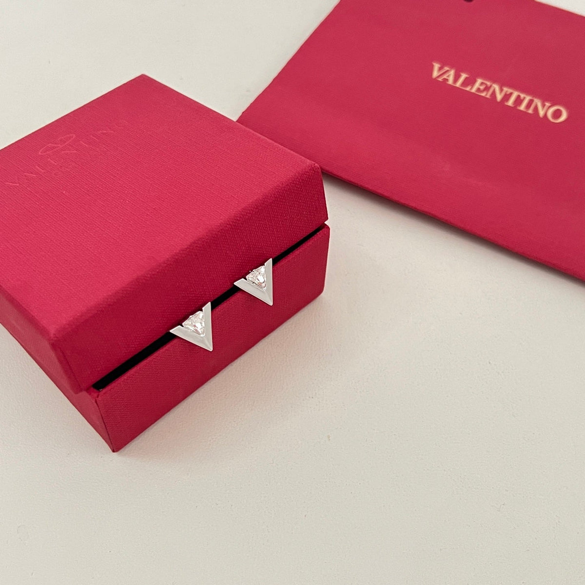 Martin Graham stud earrings in polished metal-tone – main product view