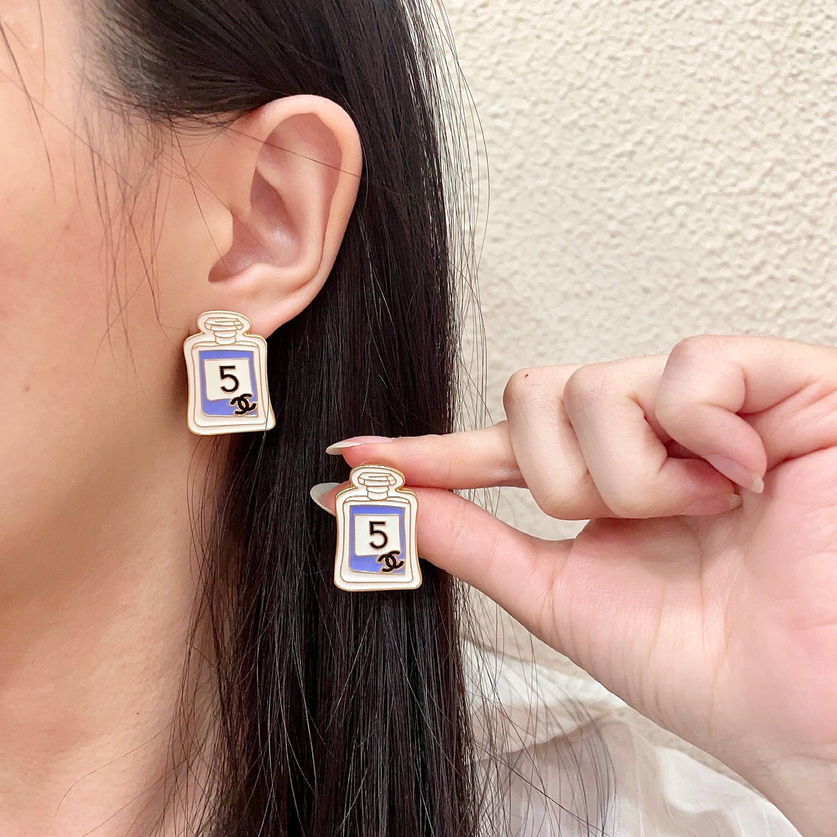 Martin Graham stud earrings in polished metal-tone – main product view