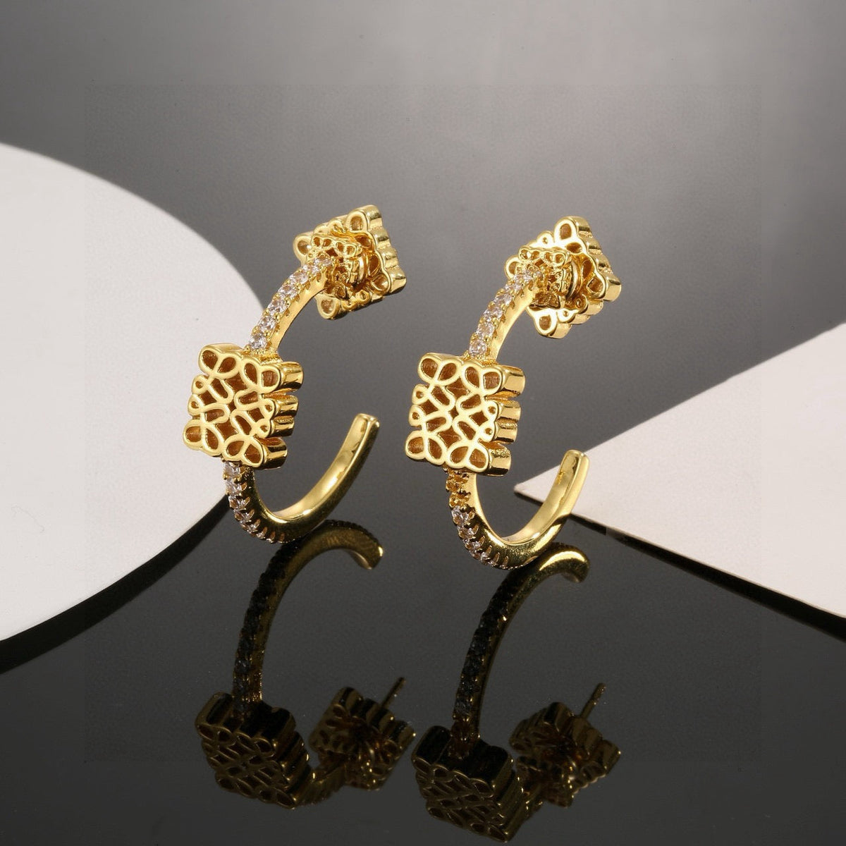 Martin Graham stud earrings in polished metal-tone – main product view