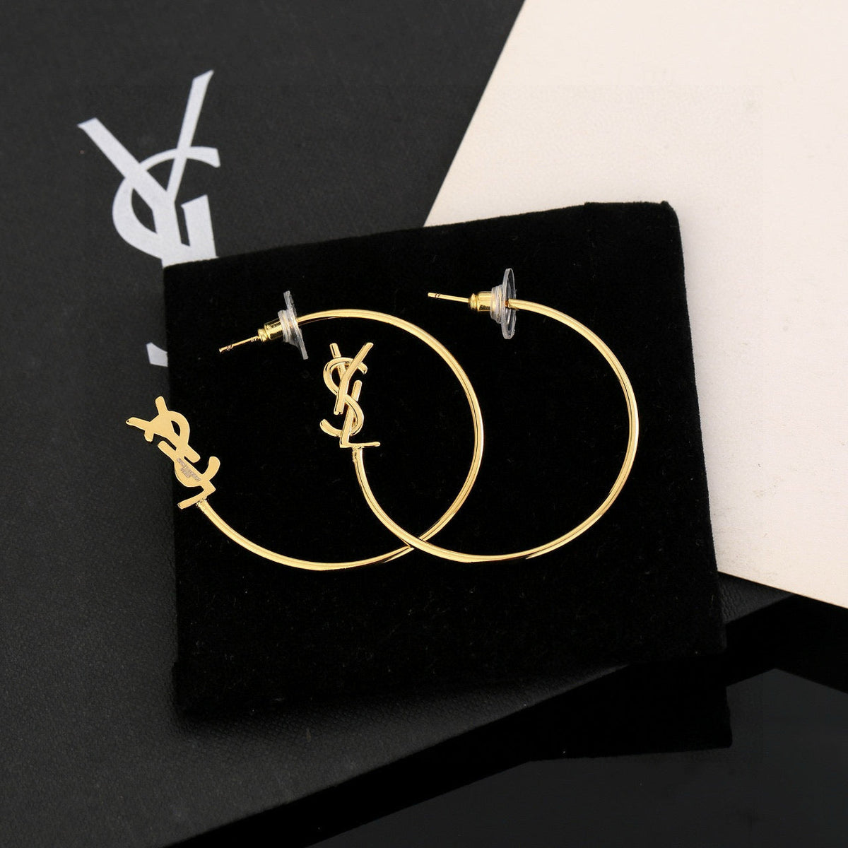 Martin Graham stud earrings in polished metal-tone – main product view