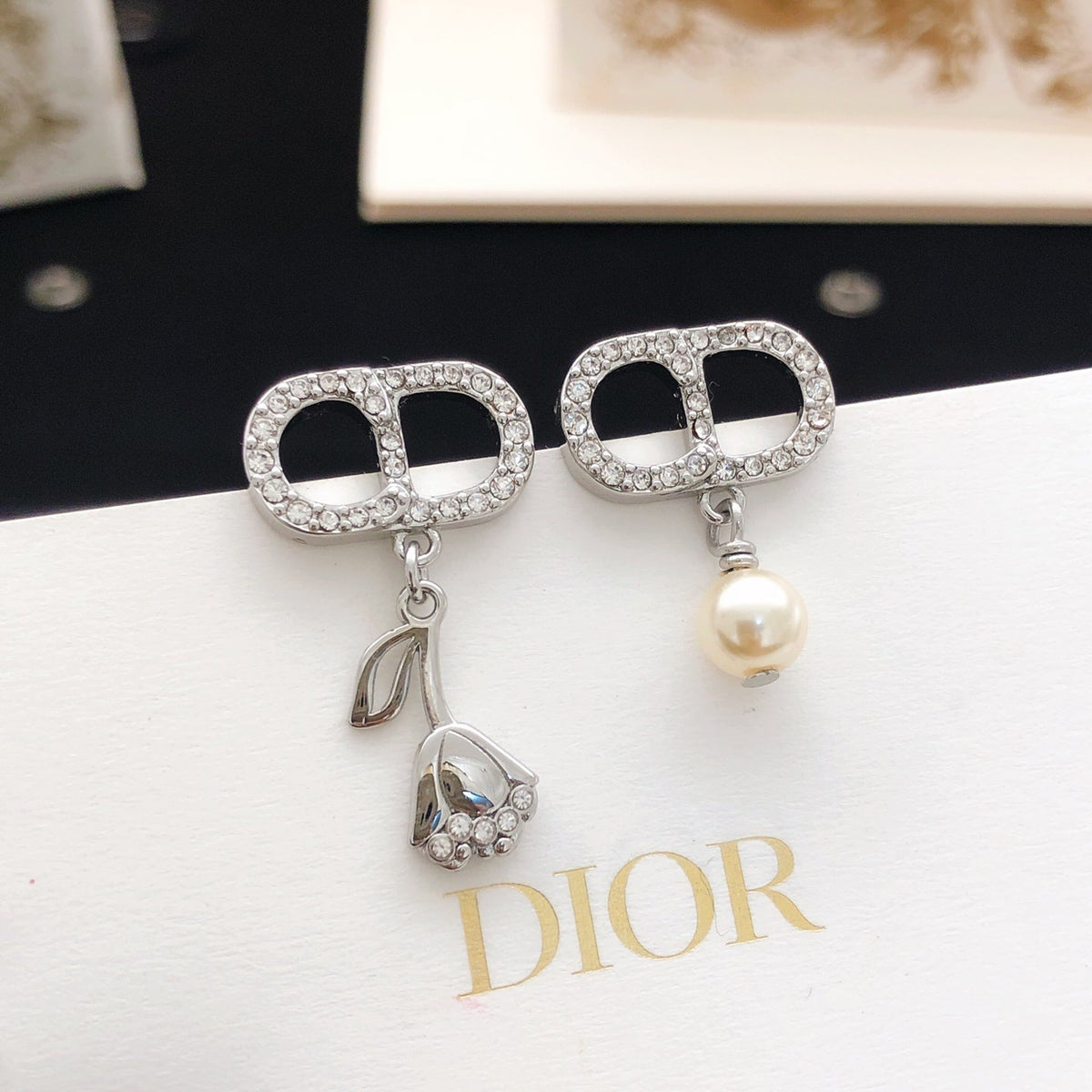 Martin Graham stud earrings in polished metal-tone – main product view