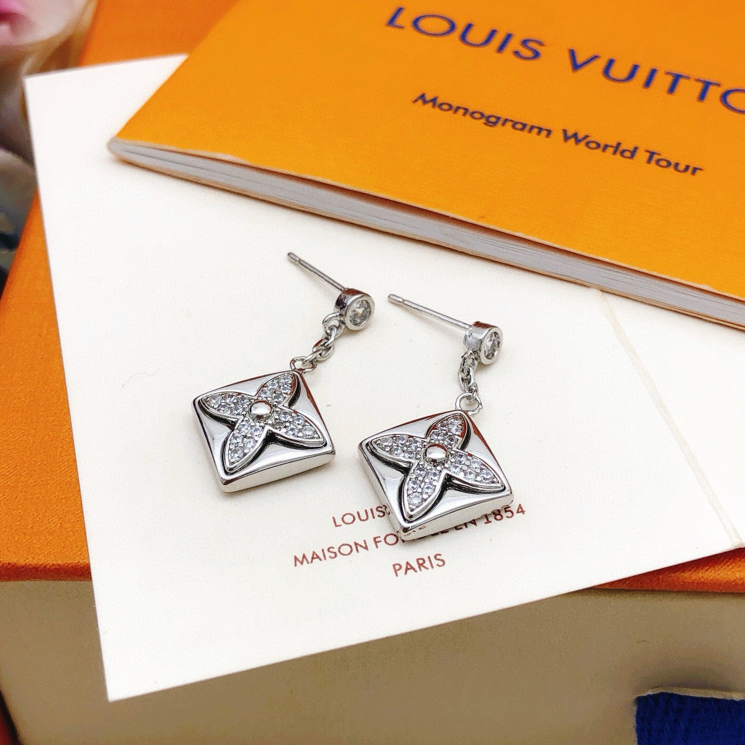 Martin Graham stud earrings in polished metal-tone – main product view