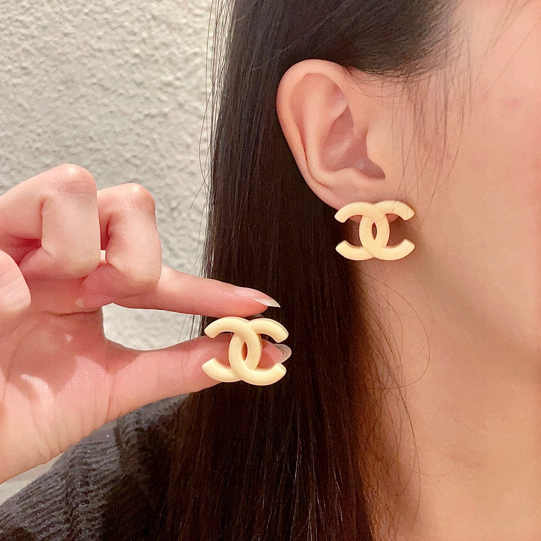 Martin Graham stud earrings in polished metal-tone – main product view