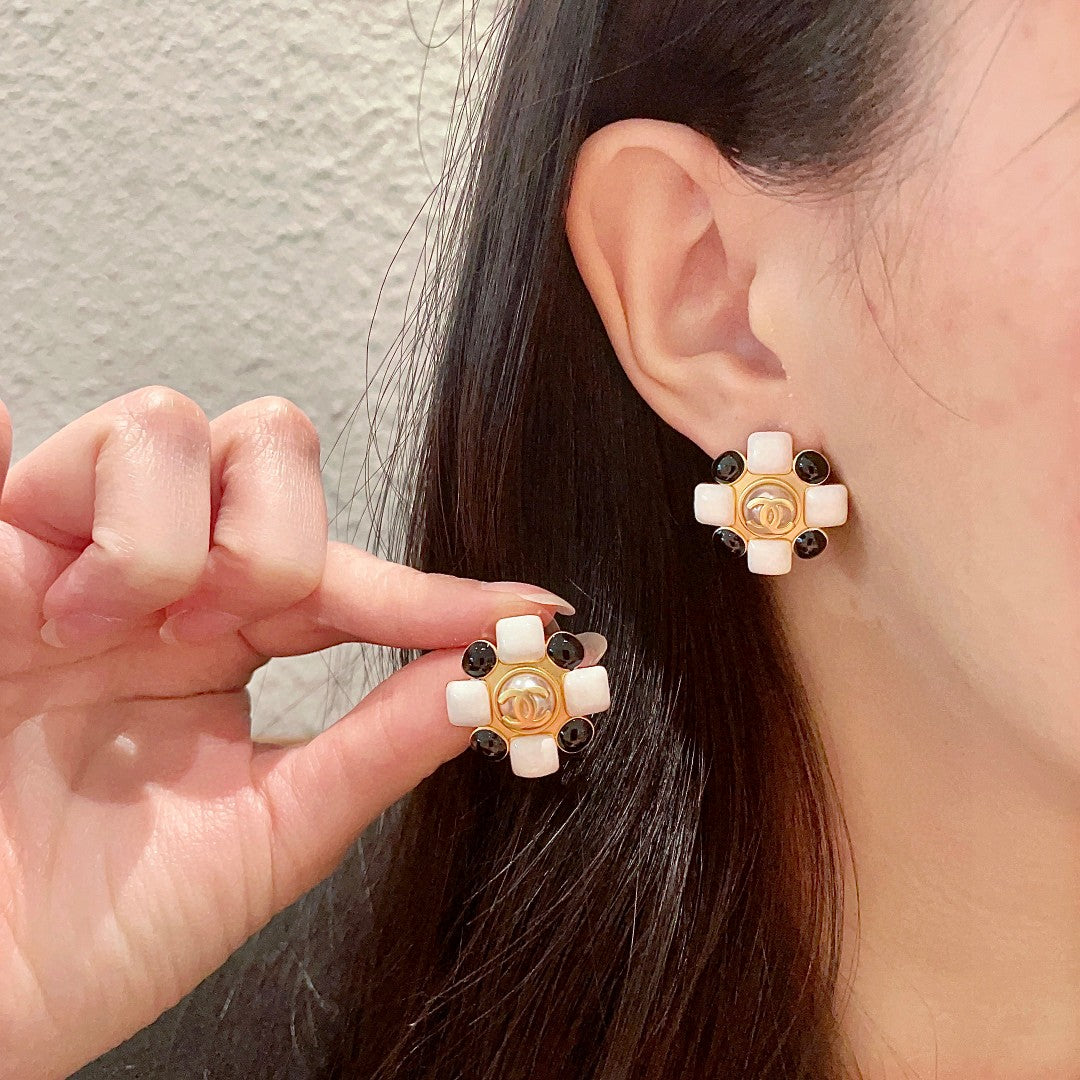 Martin Graham stud earrings in polished metal-tone – main product view