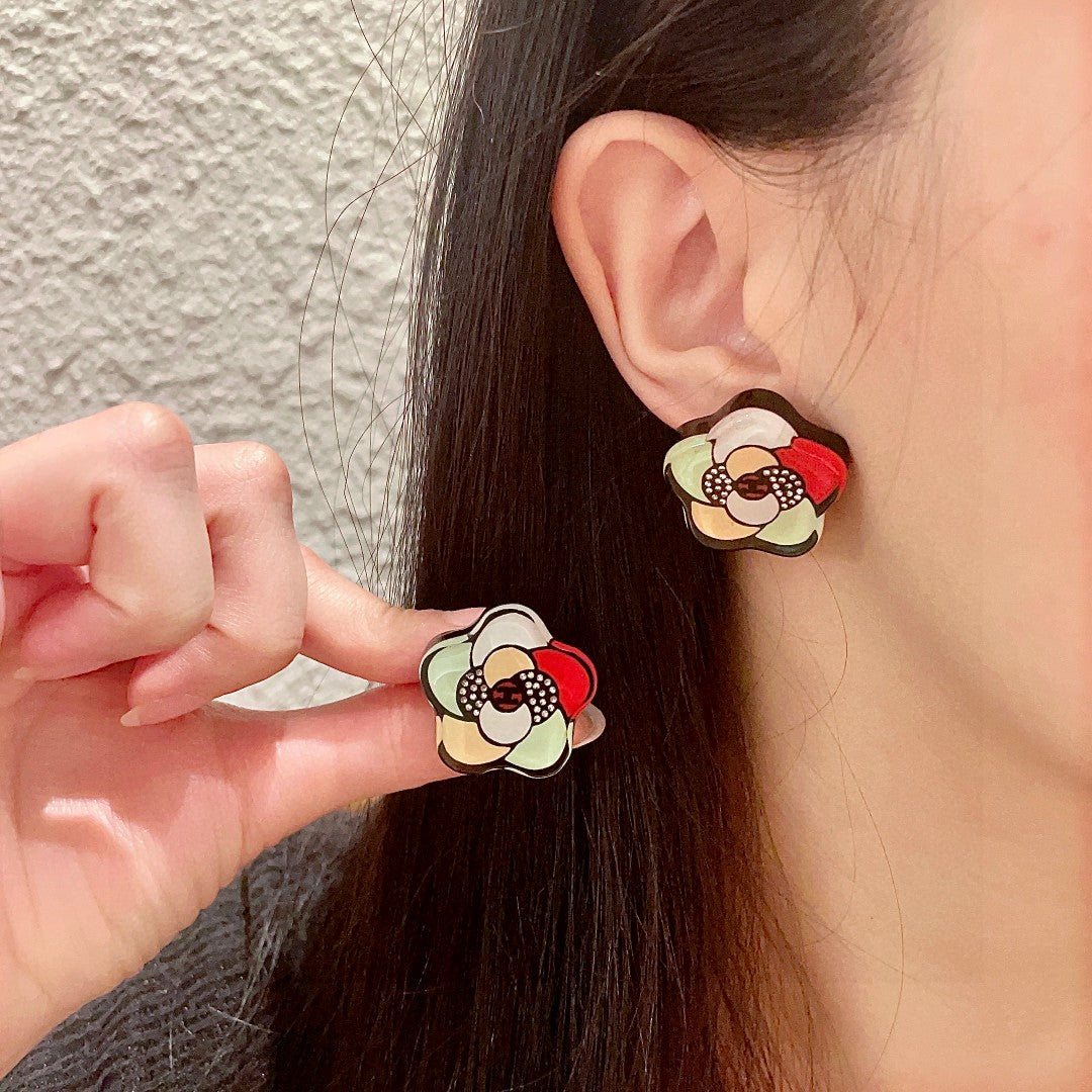 Martin Graham stud earrings in polished metal-tone – main product view