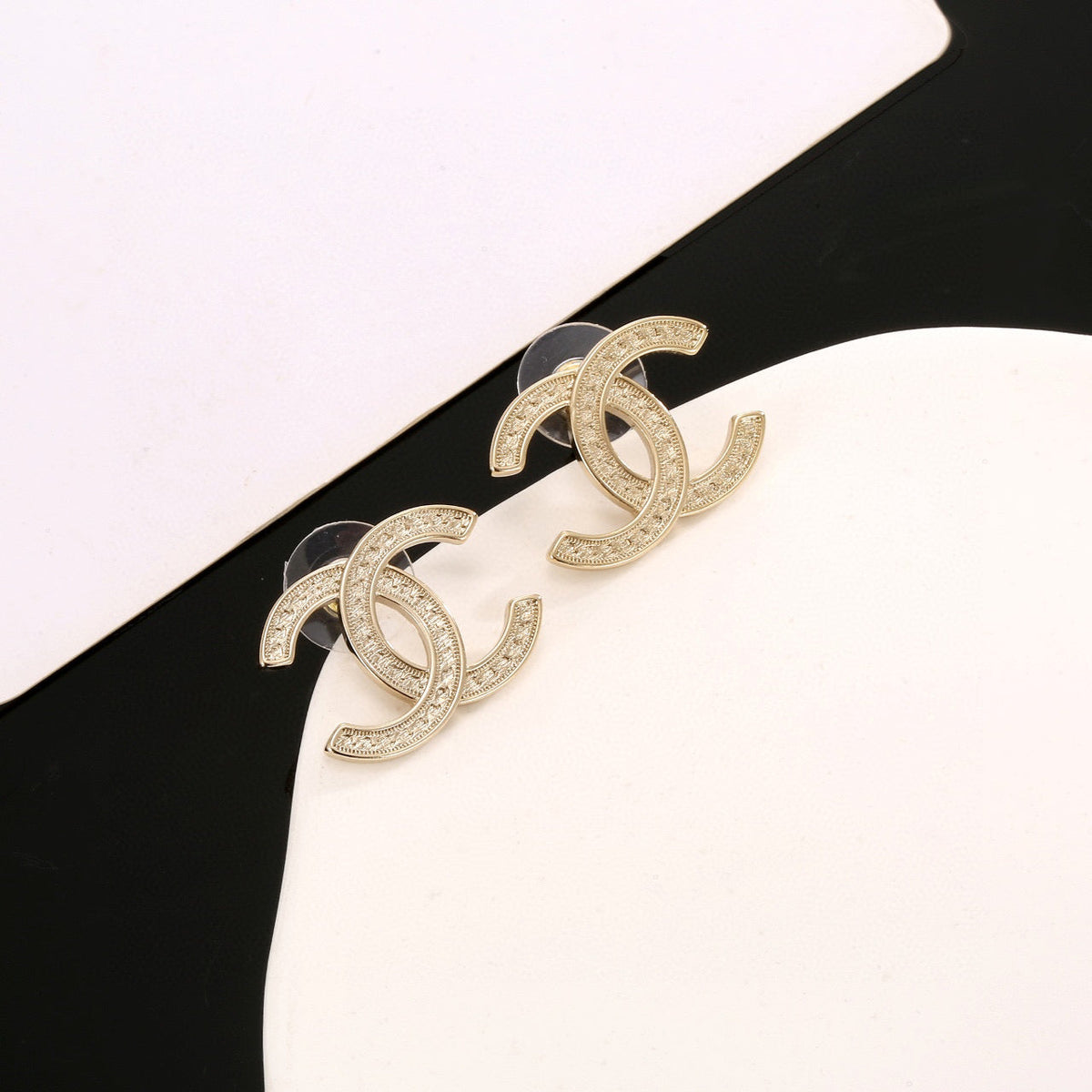 Martin Graham stud earrings in polished metal-tone – main product view