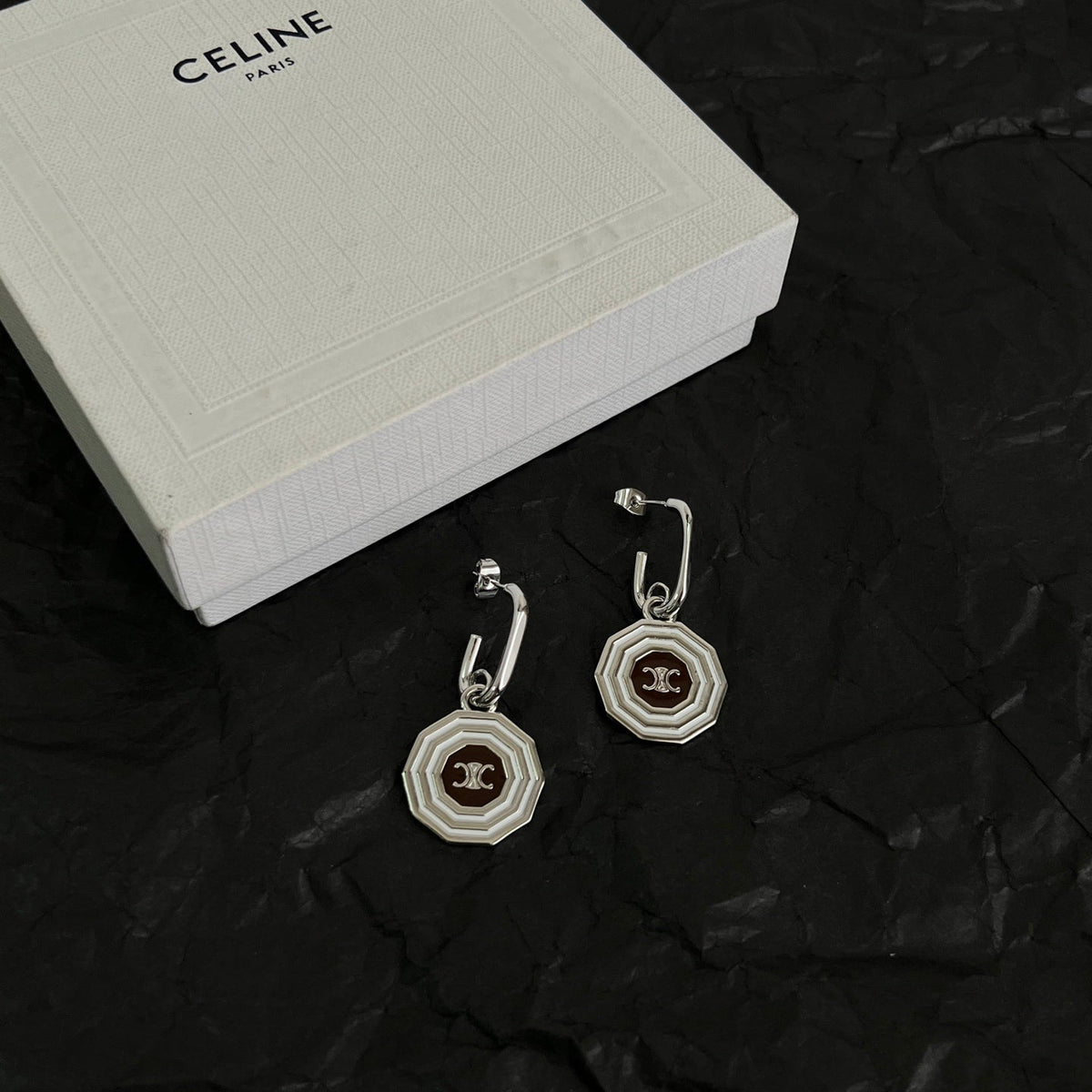 Martin Graham stud earrings in polished metal-tone – main product view