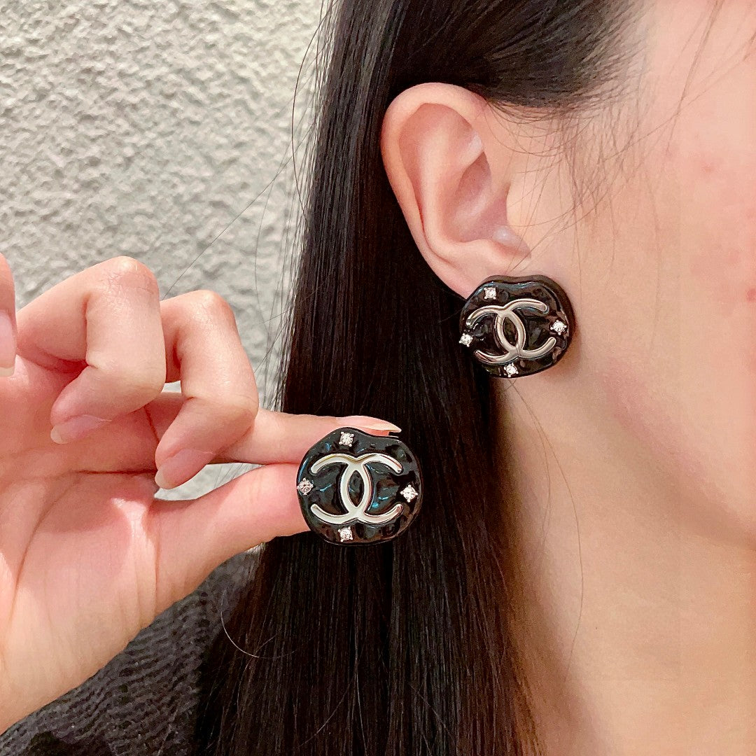 Martin Graham stud earrings in polished metal-tone – main product view