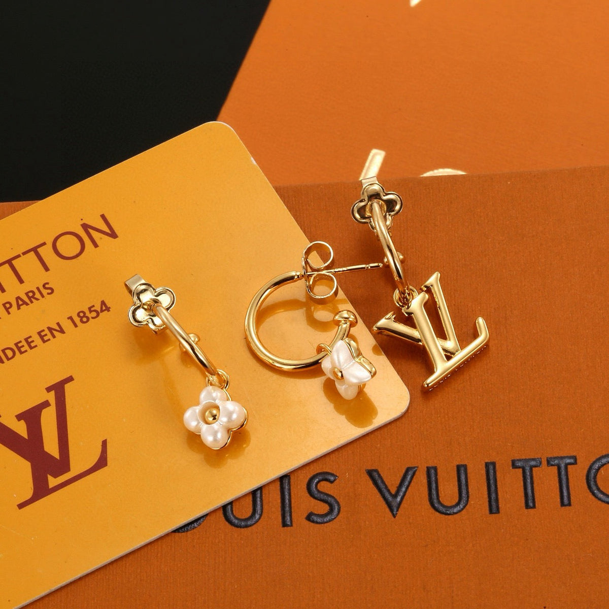 Martin Graham stud earrings in polished metal-tone – main product view