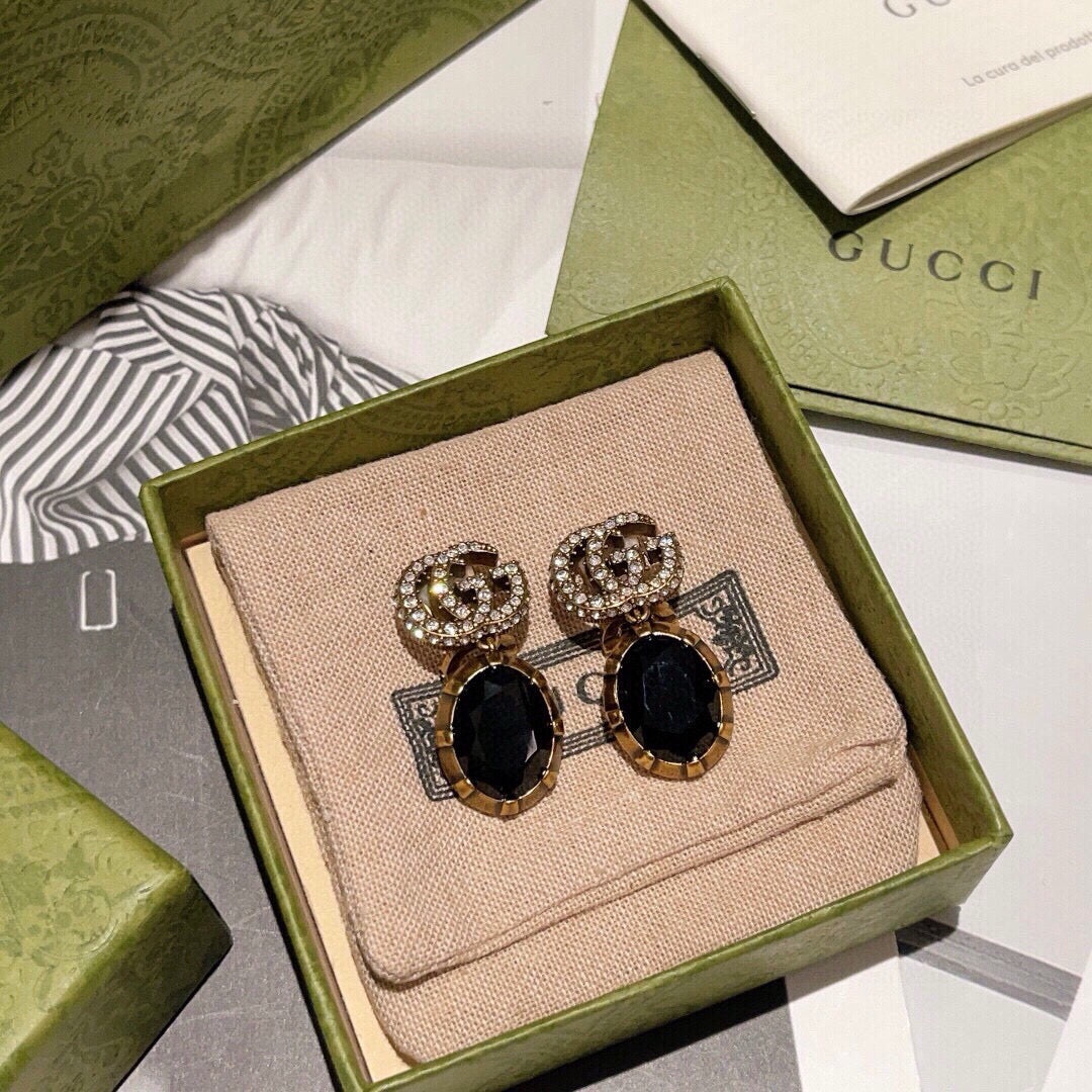 Martin Graham stud earrings in polished metal-tone – main product view