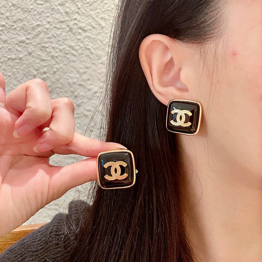 Martin Graham stud earrings in polished metal-tone – main product view