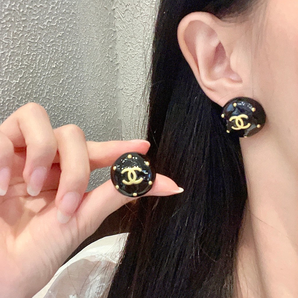 Martin Graham stud earrings in polished metal-tone – main product view