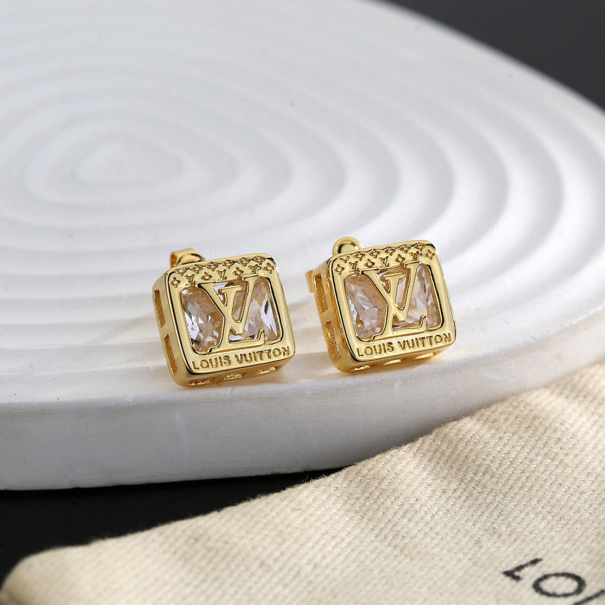Martin Graham stud earrings in polished metal-tone – main product view