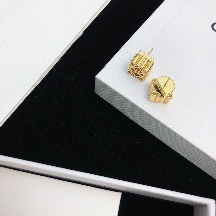 Martin Graham stud earrings in polished metal-tone – main product view