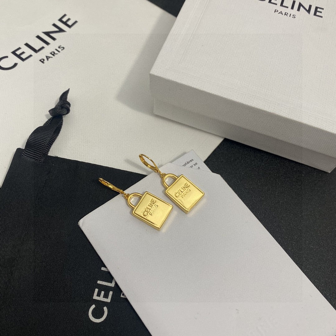 Martin Graham stud earrings in polished metal-tone – main product view