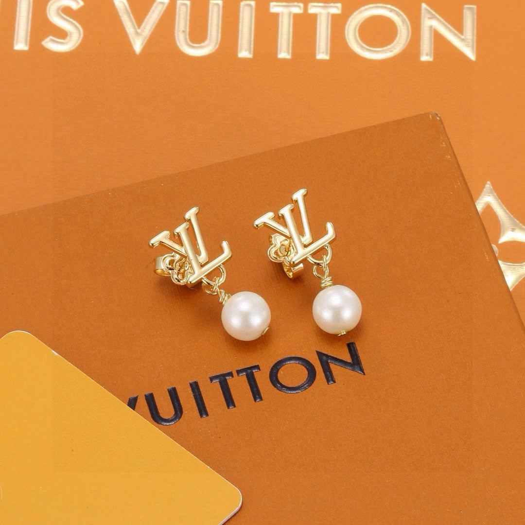 Martin Graham stud earrings in polished metal-tone – main product view