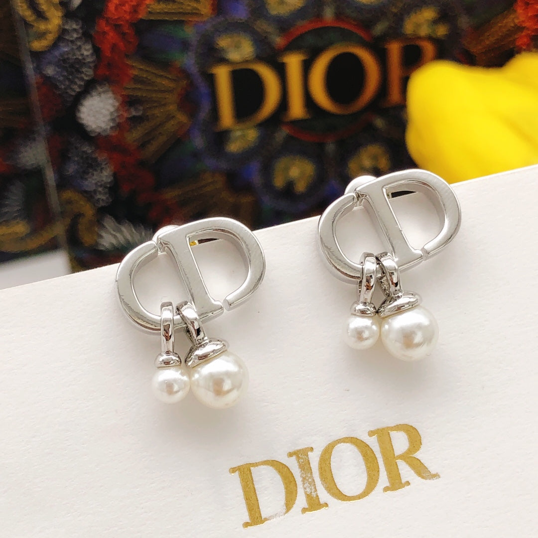 Martin Graham stud earrings in polished metal-tone – main product view