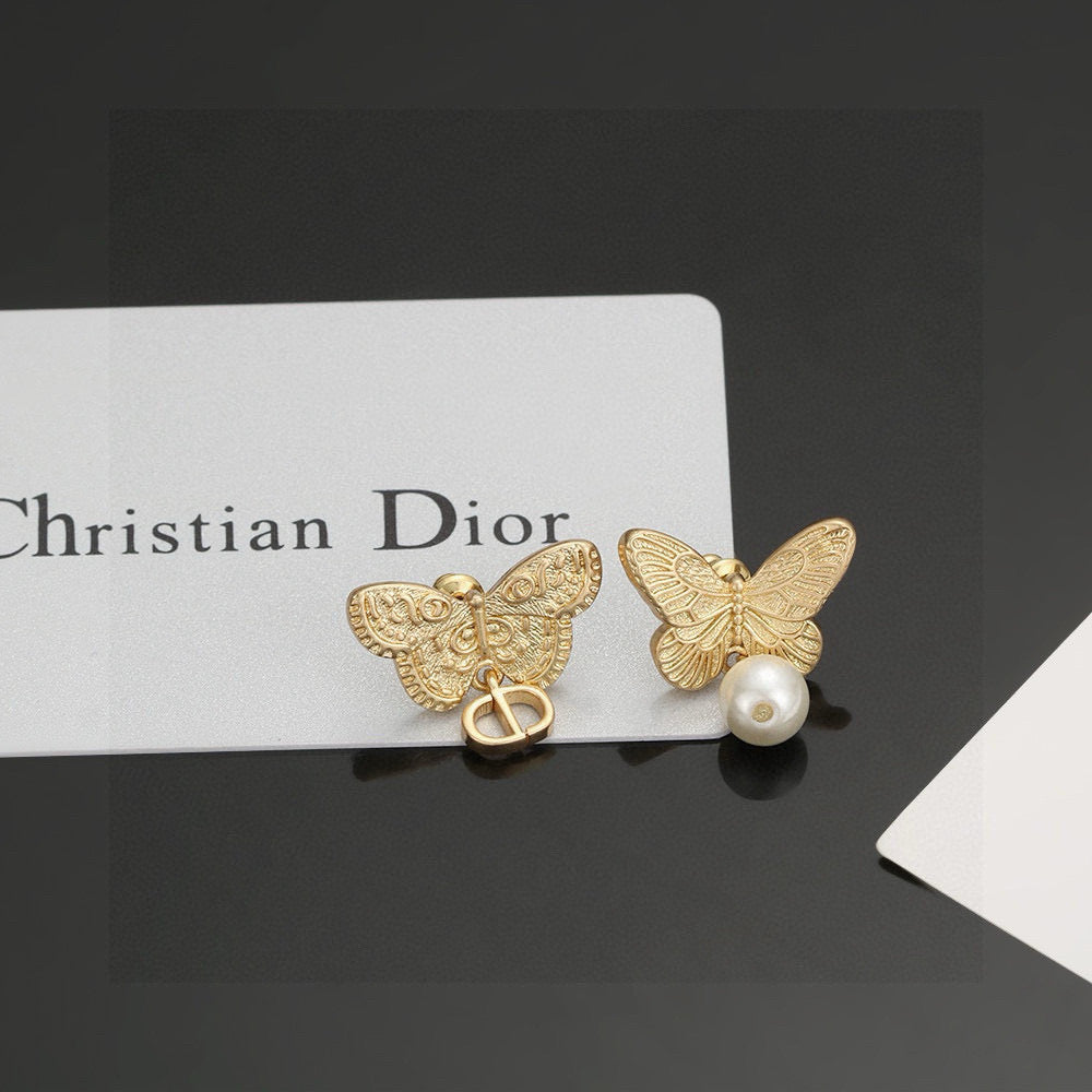 Martin Graham stud earrings in polished metal-tone – main product view