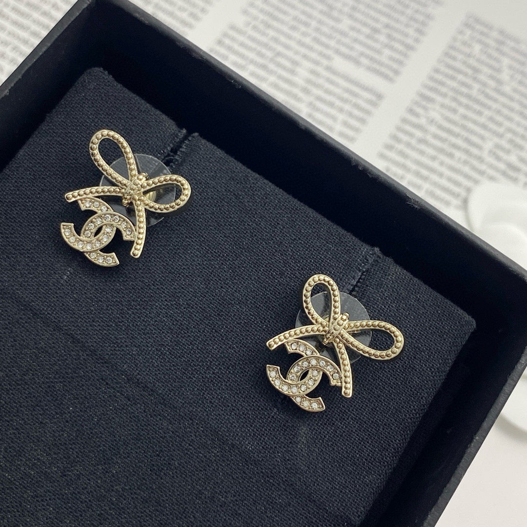 Martin Graham stud earrings in polished metal-tone – main product view