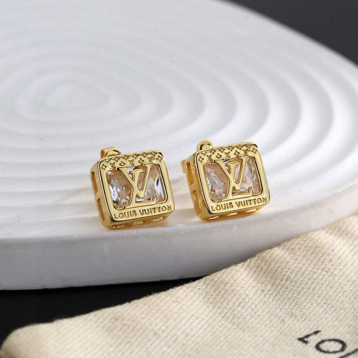 Martin Graham stud earrings in polished metal-tone – main product view