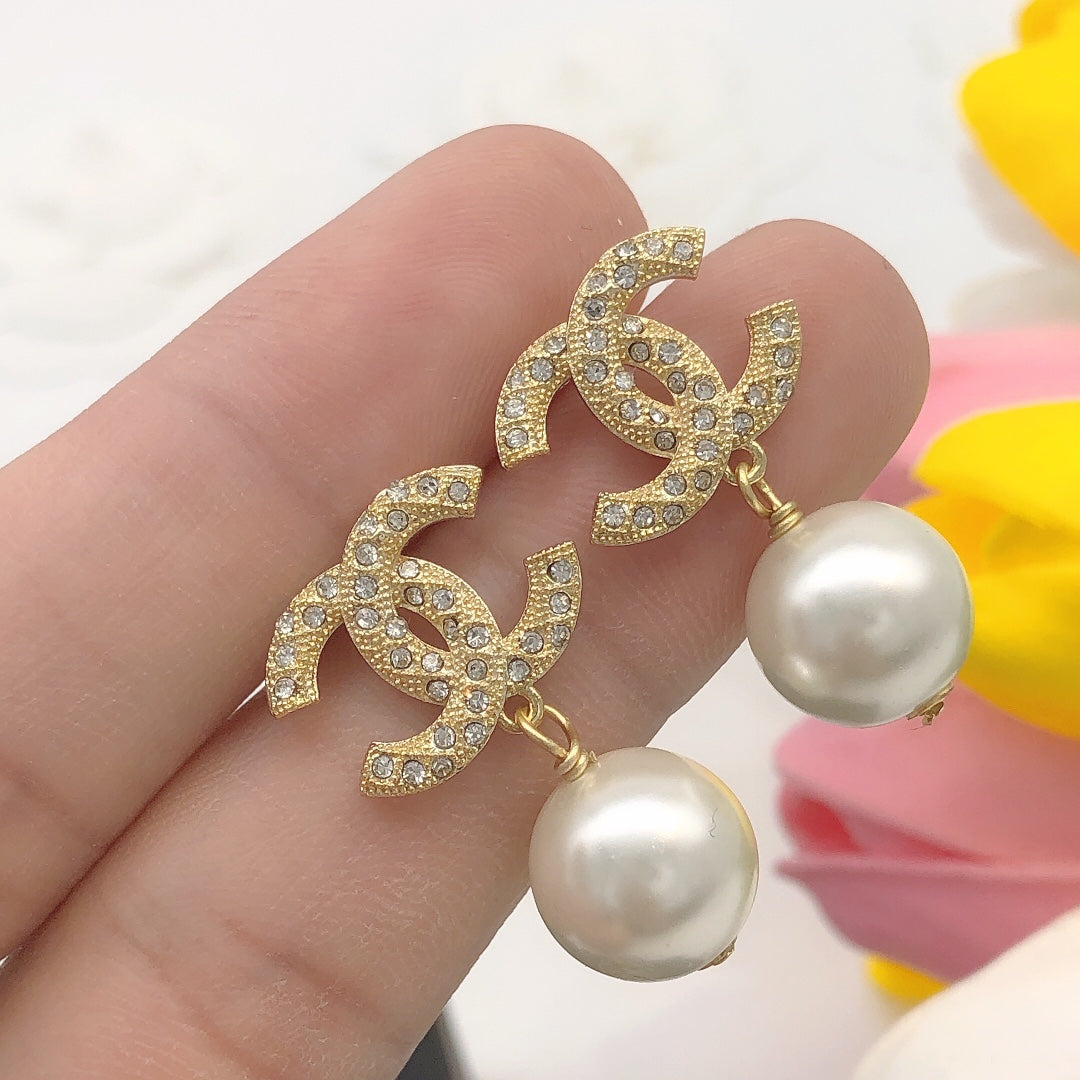 Martin Graham stud earrings in polished metal-tone – main product view