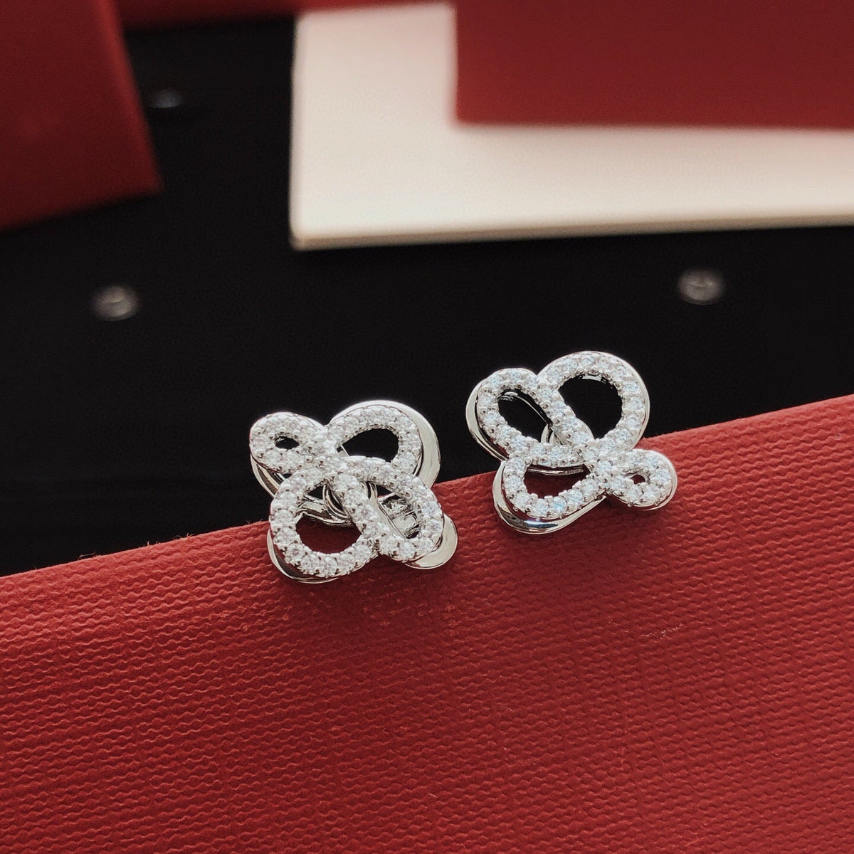Martin Graham stud earrings in polished metal-tone – main product view