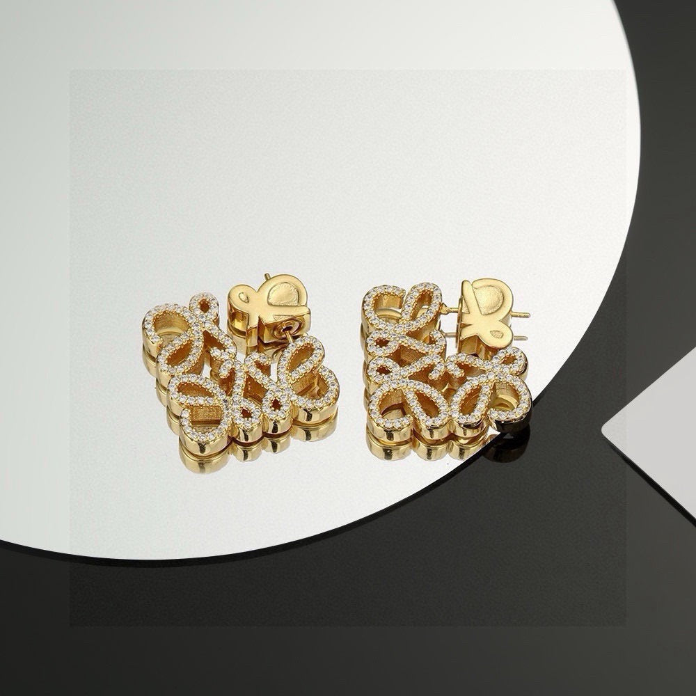 Martin Graham stud earrings in polished metal-tone – main product view